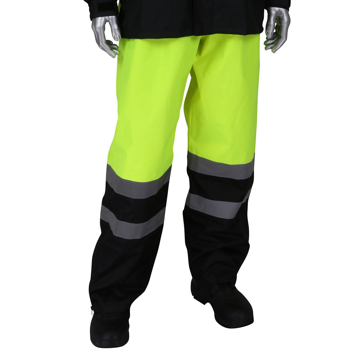 353-1202LY-4X/5X: Pantalones impermeables multiusos PIP Clase E, de alta visibilidad, amarillos, con bajos negros. Tallas 4XL/5XL